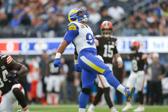 Los Angeles Rams defensive tackle Aaron Donald (99) celebrates in the first half in a game against the Cleveland Browns at SoFi Stadium.
